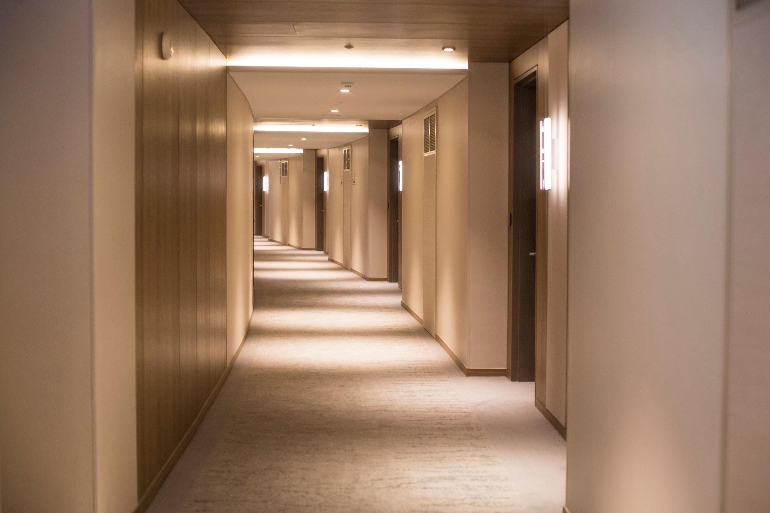 Luxury hotel corridor with access-controlled doors